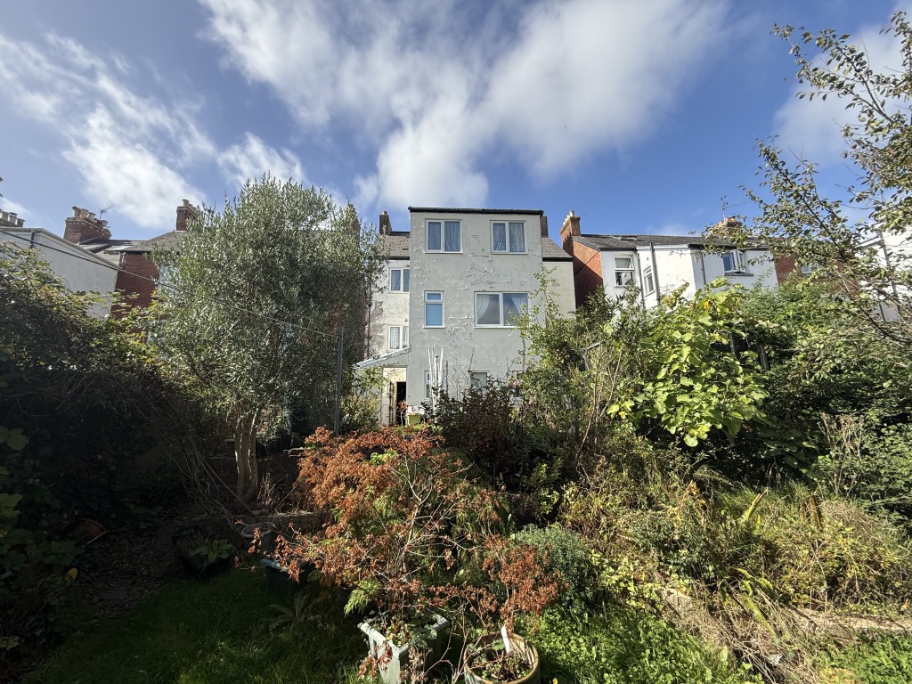 Lot: 109 - DETACHED COTTAGE IN VILLAGE LOCATION FOR UPDATING - View of the rear of property from the garden